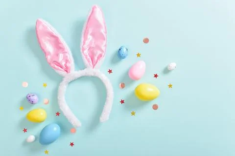 Background with rabbit ears and Easter eggs. Stock Photos