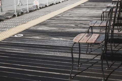 The background of railway platform for comfortable waiting seat for a coming  Stock Photos