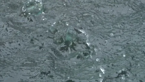 Background of the rain and circle on the water surface. Stock Footage 104494428