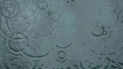 Background of the rain and circle on the water surface. Stock Footage 104494515