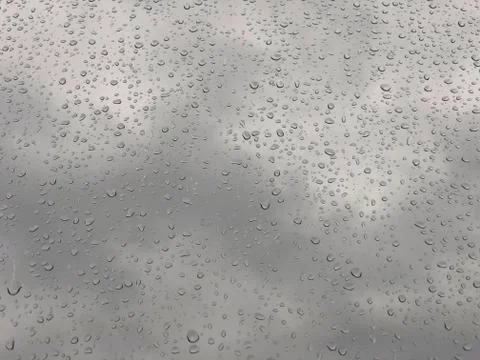 Background with rain drops on window pane Stock Photos