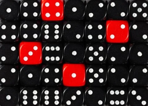 Background of random ordered black dices with four red cubes Stock Photos
