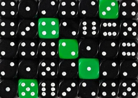 Background of random ordered black dices with five green cubes Stock Photos