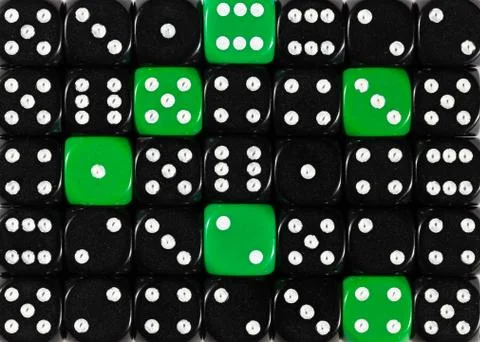 Background of random ordered black dices with six green cubes Stock Photos