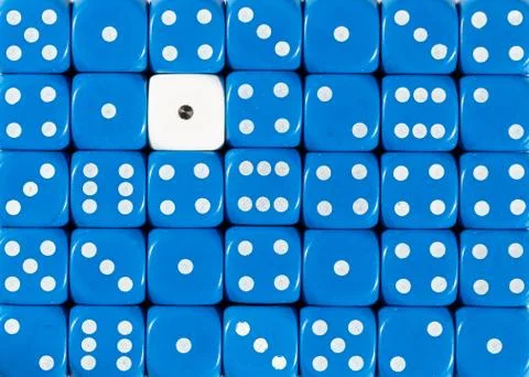 Background of random ordered blue dices with one white cube Stock Photos