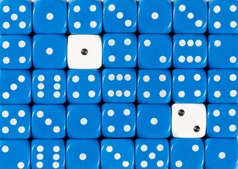 Background of random ordered blue dices with two white cubes Stock Photos