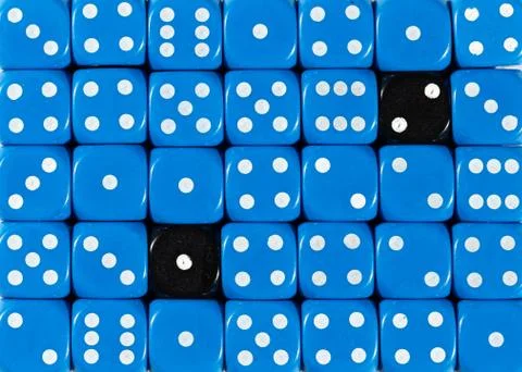 Background of random ordered blue dices with two black cubes Stock Photos
