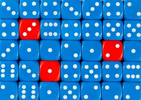 Background of random ordered blue dices with three red cubes Stock Photos