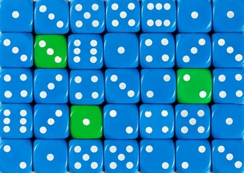 Background of random ordered blue dices with three green cubes Stock Photos