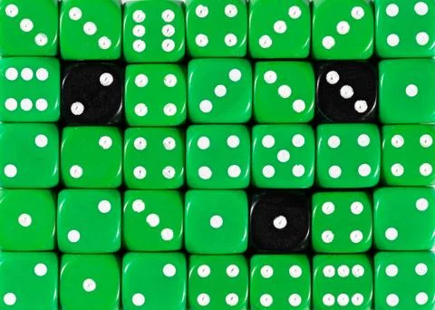 Background of random ordered green dices with three black cubes Stock Photos
