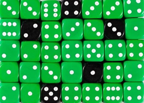 Background of random ordered green dices with five black cubes Stock Photos
