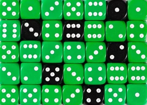 Background of random ordered green dices with six black cubes Stock Photos