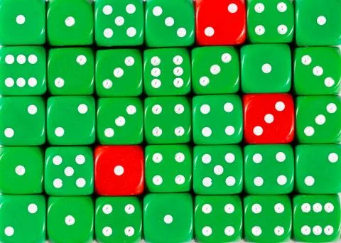 Background of random ordered green dices with three red cubes Stock Photos