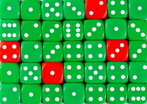 Background of random ordered green dices with four red cubes Stock Photos