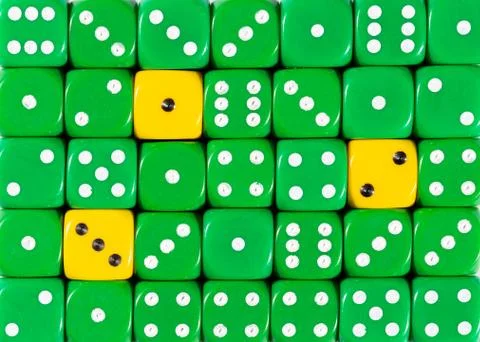Background of random ordered green dices with three yellow cubes Stock Photos