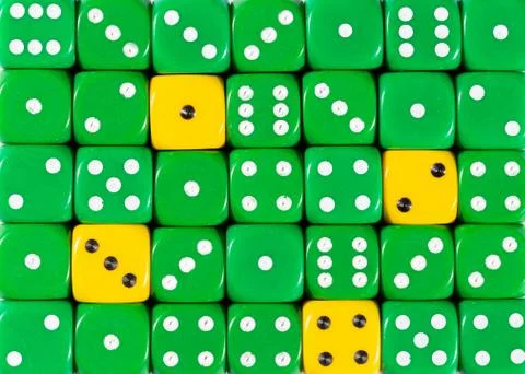 Background of random ordered green dices with four yellow cubes Stock Photos