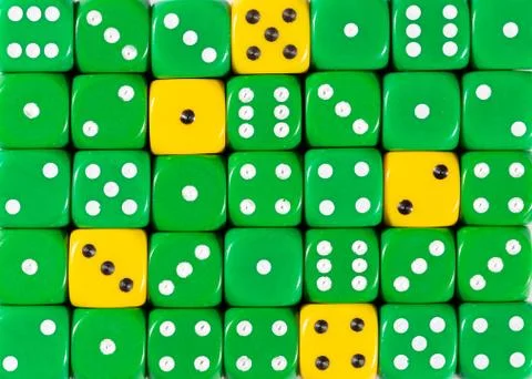 Background of random ordered green dices with five yellow cubes Stock Photos