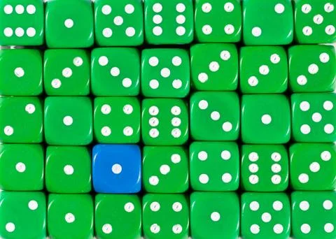 Background of random ordered green dices with one blue cube Stock Photos