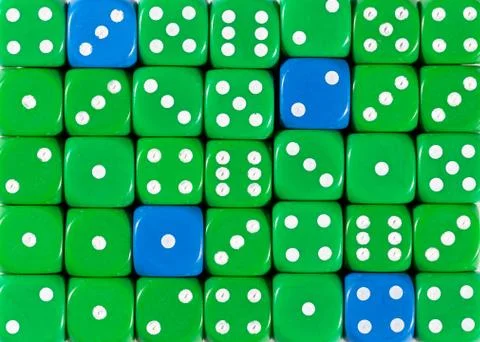 Background of random ordered green dices with four blue cubes Stock Photos