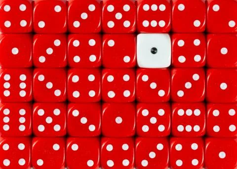 Background of random ordered red dices with one white cube Stock Photos