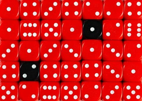 Background of random ordered red dices with two black cubes Stock Photos