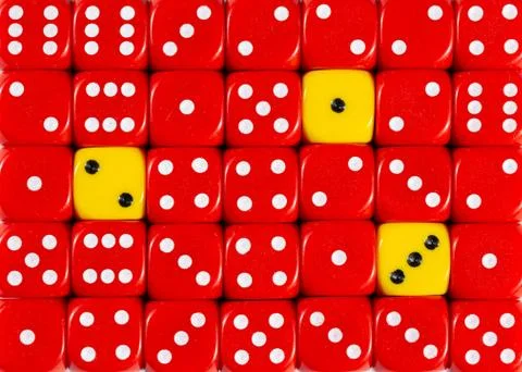 Background of random ordered red dices with three yellow cubes Stock Photos