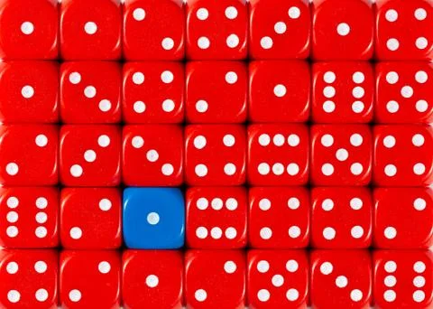 Background of random ordered red dices with one blue cube Stock Photos