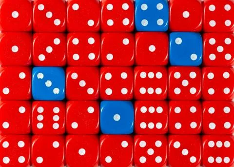 Background of random ordered red dices with four blue cubes Stock Photos