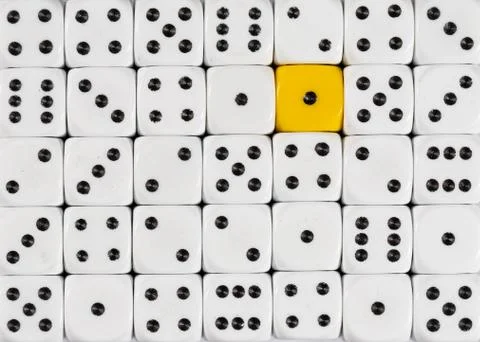Background of random ordered white dices with one yellow cube Stock Photos