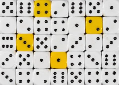 Background of random ordered white dices with four yellow cubes Stock Photos