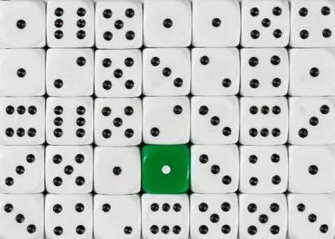 Background of random ordered white dices with one green cube Stock Photos