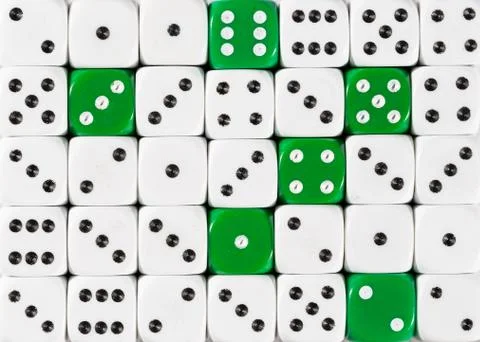 Background of random ordered white dices with six green cubes Stock Photos