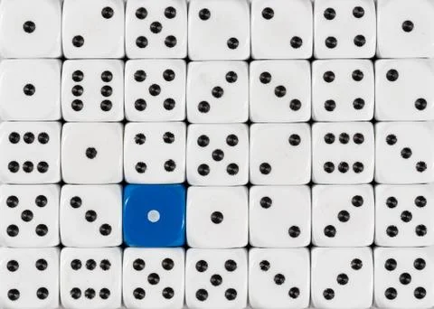 Background of random ordered white dices with one blue cube Stock Photos