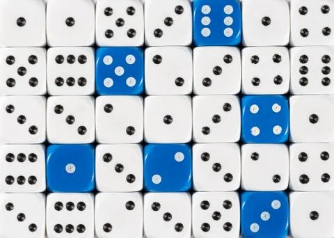 Background of random ordered white dices with six blue cubes Stock Photos