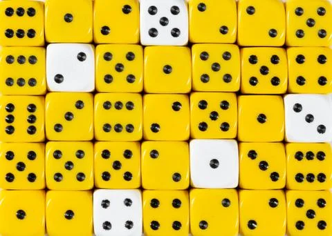 Background of random ordered yellow dices with five white cubes Stock Photos