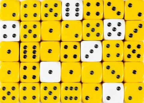 Background of random ordered yellow dices with six white cubes Stock Photos
