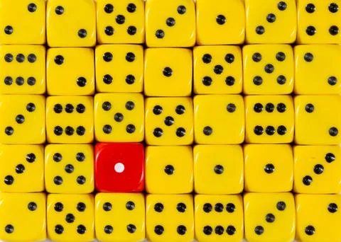 Background of random ordered yellow dices with one red cube Stock Photos