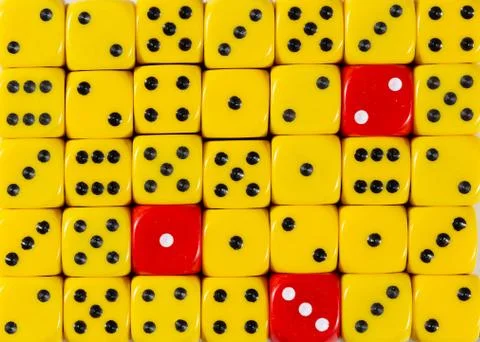 Background of random ordered yellow dices with three red cubes Stock Photos