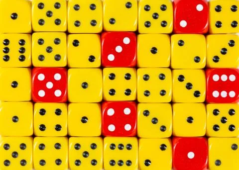 Background of random ordered yellow dices with six red cubes Stock Photos