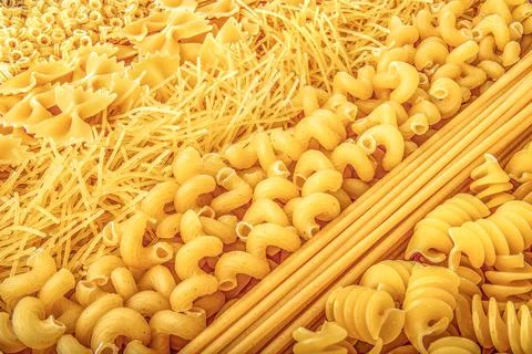 Background of raw pasta Stock Photos