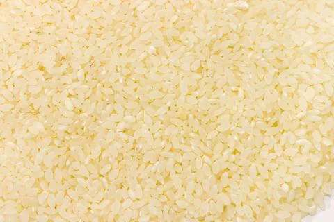 Background of raw short-grained white rice Stock Photos