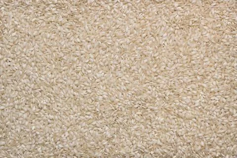 Background of raw white rice Stock Photos