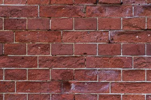 The background is a red brick. Brick wall background. The red brick wall Stock Photos