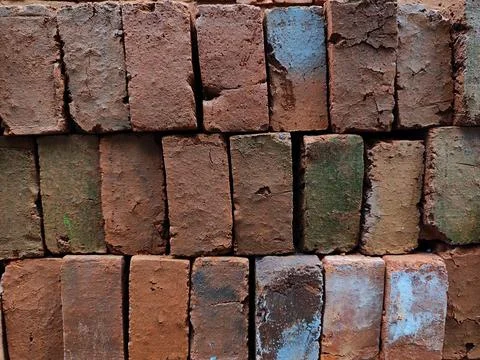 Background of red brick pile Stock Photos