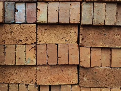 Background of red brick pile Stock Photos