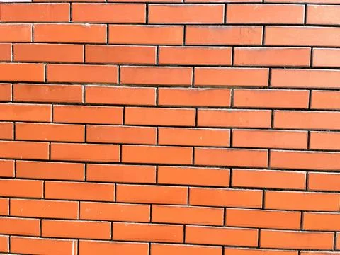 Background red brick with smooth texture Stock Photos