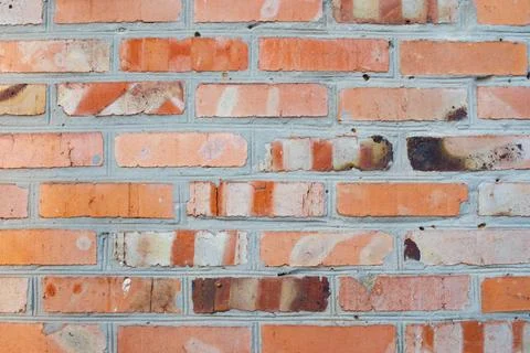 Background, red brick wall close up. Stock-Fotos