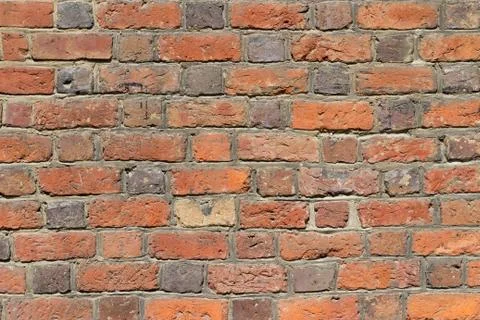 Background of red brick wall pattern texture. Stock Photos