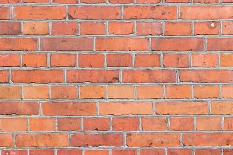 Background of red brick wall pattern texture. Stock Photos