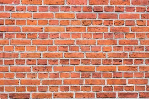 Background of red brick wall pattern texture. Stock Photos